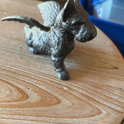 Cast iron dog with wings 