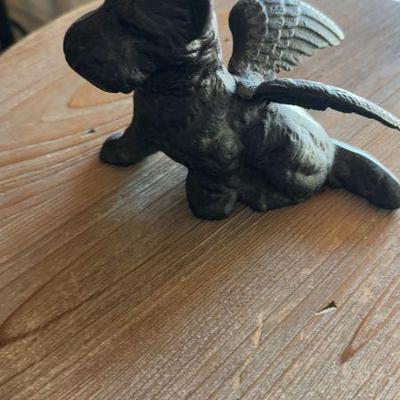 Cast iron dog with wings 