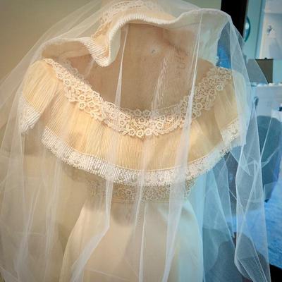 Vintage wedding dress and hat with veil