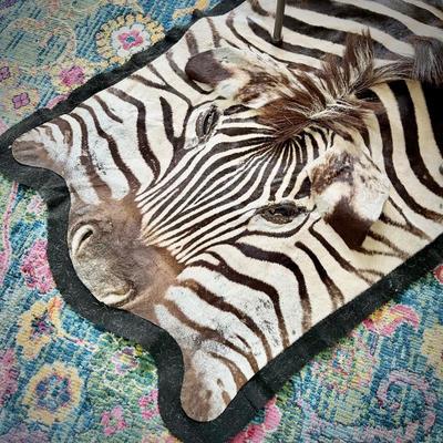 Authentic zebra hide - can use as a rug, a wall-hanging, or a throw