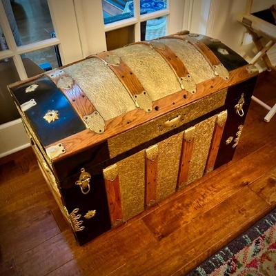 Vintage steamer trunk with wood deer head