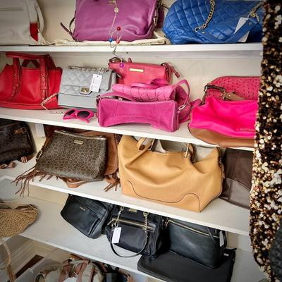 Collection of 50-60 handbags - small portion shown here