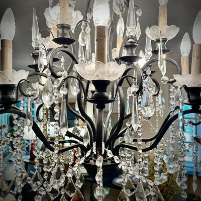 All light fixtures are for sale. One of two chandeliers. This one is located in the Dining Room.