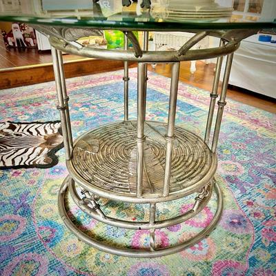 Glass dining table with metal base