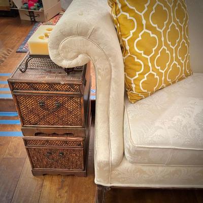Ivory Chippendale-style camelback sofa