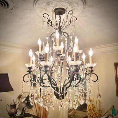 All light fixtures are for sale. One of two chandeliers. This one is located in the Dining Room.