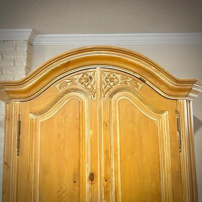 Pine armoire with lock and interior drawers