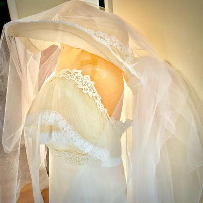 Vintage wedding dress and hat with veil