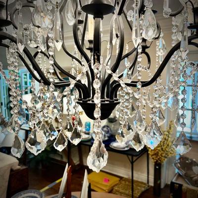 All light fixtures are for sale. One of two chandeliers. This one is located in the Dining Room.