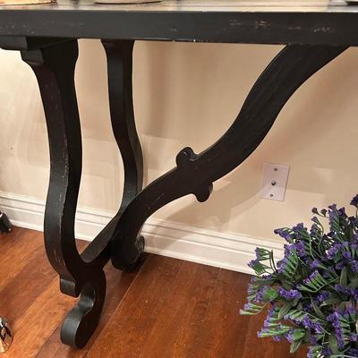 Wood console table with curved legs