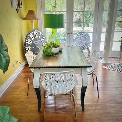 Refinished dining table and 12 stackable chairs 