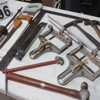 carpentry tools, - but hinge jigs, hammers, framing square, saws, nail pu ller