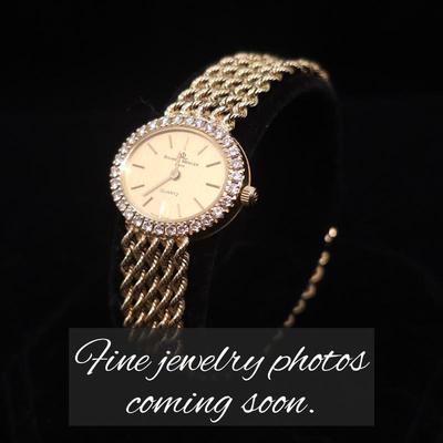 Baum Mercier 14k and diamond watch