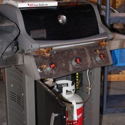 Weber grill and propane tank 