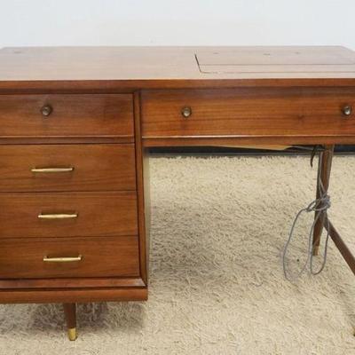 1134	MODERN SINGER SEWING MACHINE IN WALNUT STAND HAVING 3 DRAWERS, ATTACHMENTS AND PERIPHERALS INCLUDED. TOUCH AND SEW 603E,...