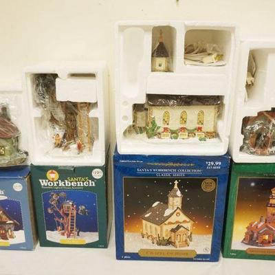 1260	GROUP OF 4 PORCELAIN SANTAS WORKBENCH COLLECTION BUILDINGS IN BOXES
