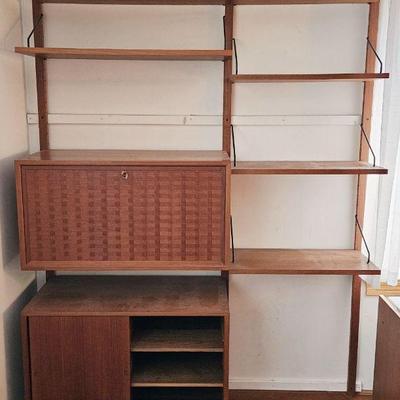 1146A	DANISH MID CENTURY MODERN ADJUSTABLE WALL UNIT WITH 6 SHELVES AND 2 DOOR CABINET AND FALL FRONT CABINET WITH BASKET WOVEN DESIGN,...