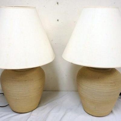 1111	PAIR OF POTTERY TABLE LAMPS

