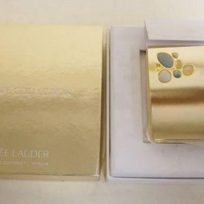 1190	ESTEE LAUDER PRIVATE COLLECTION TUBEROSE GARDENIA SOLID MIRROR/COMPACT UNUSED
