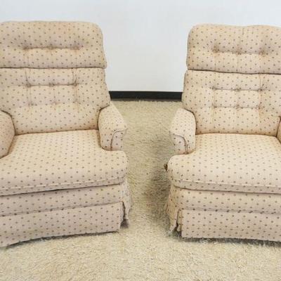 1165	PAIR OF UPHOLSTERED ARM SWIVEL RECLINING CHAIRS
