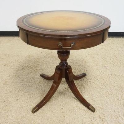 Sale Photo Thumbnail #168: 1168	MAHOGANY LEATHER TOP DRUM TABLE APPROXIMATELY 28 IN X 28 IN H, SOME FADING TO LEATHER TOP
