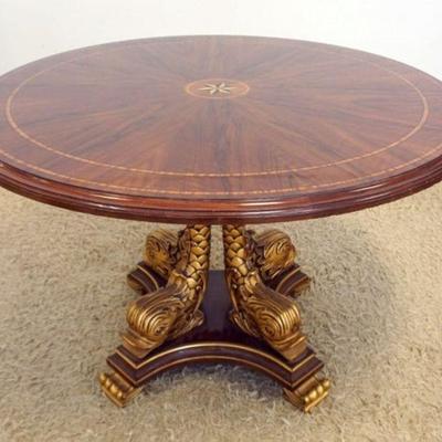 1173	KARGES ROUND TABLE WITH INLAID STAR AND BANDED TOP ON GILT DOLPHINS BASE, APPROXIMATELY 48 IN X 31 IN H
