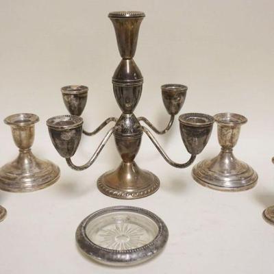1103	STERLING SILVER WEIGHTED GROUP INCLUDING CANDLESTICKS, SALT & PEPPER, ETC., TALLEST PIECE APPROXIMATELY 9 1/4 IN H
