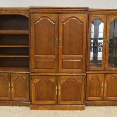 1150	BASSETT CONTEMPORARY OAK 3 SECTION WALL UNIT WITH MIRROR BACK AND INTERIOR LIGHTS
