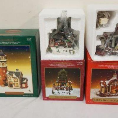 1262	GROUP OF 4 PORCELAIN SANTAS WORKBENCH COLLECTION BUILDINGS IN BOXES
