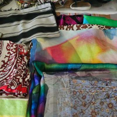 Many Silk Scarves- Vera Wang  and 1 Peter Maxx. When she was younger worked at a Dept Store. Couldn't afford the fancy clothes, so...