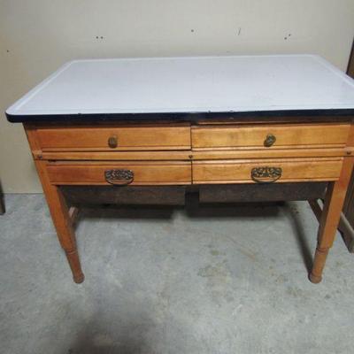 Granite top possum belly table (likely the bottom of a hoosier cabinet)