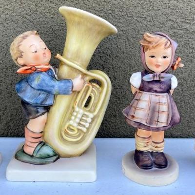 (4) Goebel Hummels - 1963 Which Hand, 1983, Tuba Player, 1991 Accordion Player, 1973 Girl With Basket