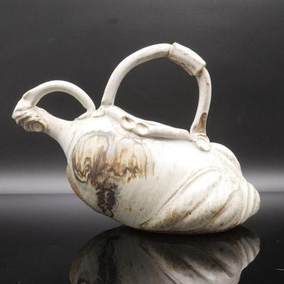 Unique Handmade Earthenware Pitcher with Intricate Design