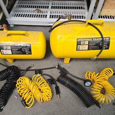 #2130 • (2) Central Pneumatic Portable Air Tanks with Extra Air Hoses