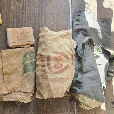 #8070 • (12) Burlap Sacks (1) Green Duffle