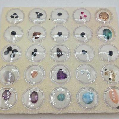 #682 • Over 30 Semi-Precious Stones in Sealed Casings
