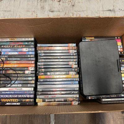 #8144 • Box of DVD Movies & Portable DVD Player