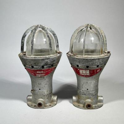 (2pc) PAIR CROUSE HINDS INDUSTRIAL LIGHTS | Pair of Crouse-Hinds explosion-proof lighting fixtures with EV 505 guard, GUEX 16 conduit,...