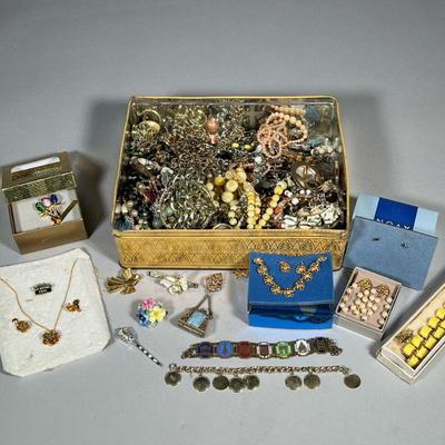 LARGE LOT VINTAGE COSTUME JEWELRY | A large collection of vintage costume jewelry, including necklaces, pins, earrings, rosaries, etc.

