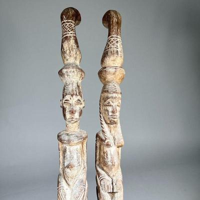 (2pc) PAIR INDIAN CARVED WALKING STICKS | Carved wood walking sticks with male and female figural depictions - l. 38.5 in

