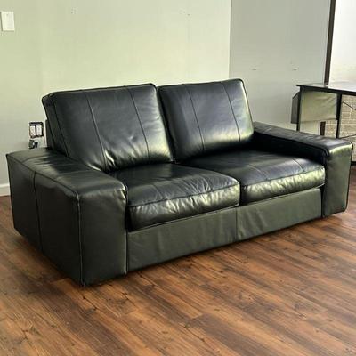 IKEA BLACK LEATHER SOFA | Black leather loveseat, two cushions. - h. 25 x w. 36 x l. 74 in

