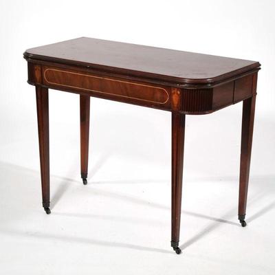 ANTIQUE FLIP-TOP TABLE | Regency breakfast or games table, extending base with fold-out support legs, decorated with reeding and urn and...