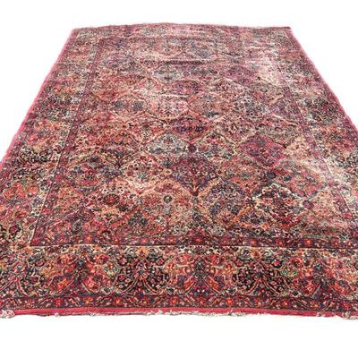 KARASTAN WOOL CARPET | Having an overall pattern on a red ground. - w. 12' 2" x l. 8' 8" ft

