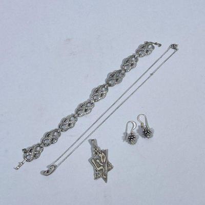 MIXED STERLING JEWELRY | Including: sterling silver chain with round pendant, both marked “925” (2.5g), pinecone form sterling silver...