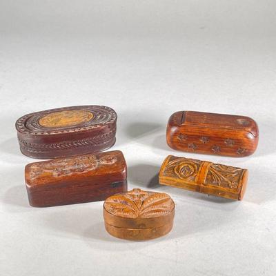 (4pc) CARVED SNUFF BOXES | Including; small floral boxes, Star carved stamp box, and coffin-like box with skeleton carving - h. 1.5 x w....