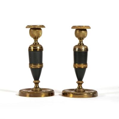(2pc) PAIR FRENCH BRONZE CANDLESTICKS | Spun bronze with black sections and finely engraved patterned, both marked "Made in...