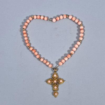 18K & 14K GOLD & CORAL CROSS | Designed as an 18K gold crucifix with carved coral beads marked “K18” (14g) and 14K gold &...