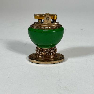 RONSON TABLE LIGHTER | Green and brass "Leona" table lighter. - h. 2-3/4 x l. 2-1/8 in

