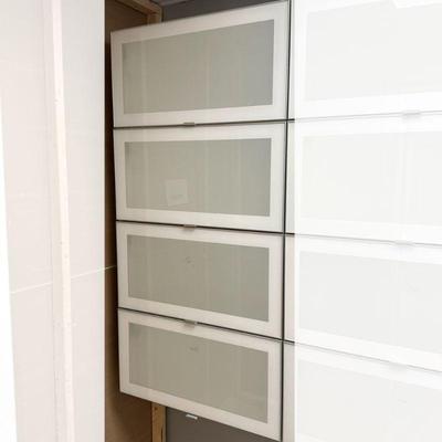(2pc) PAIR IKEA SEKTION CABINETS | Pair of IKEA horizontal Sektion cabinets, each unit having 2 flip-up glass doors with central glass...