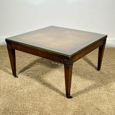LEATHER TOP LOW TABLE | Inlay leather top with gilt border and carved flower corners. - h. 15.5 x w. 27 x l. 27 in

